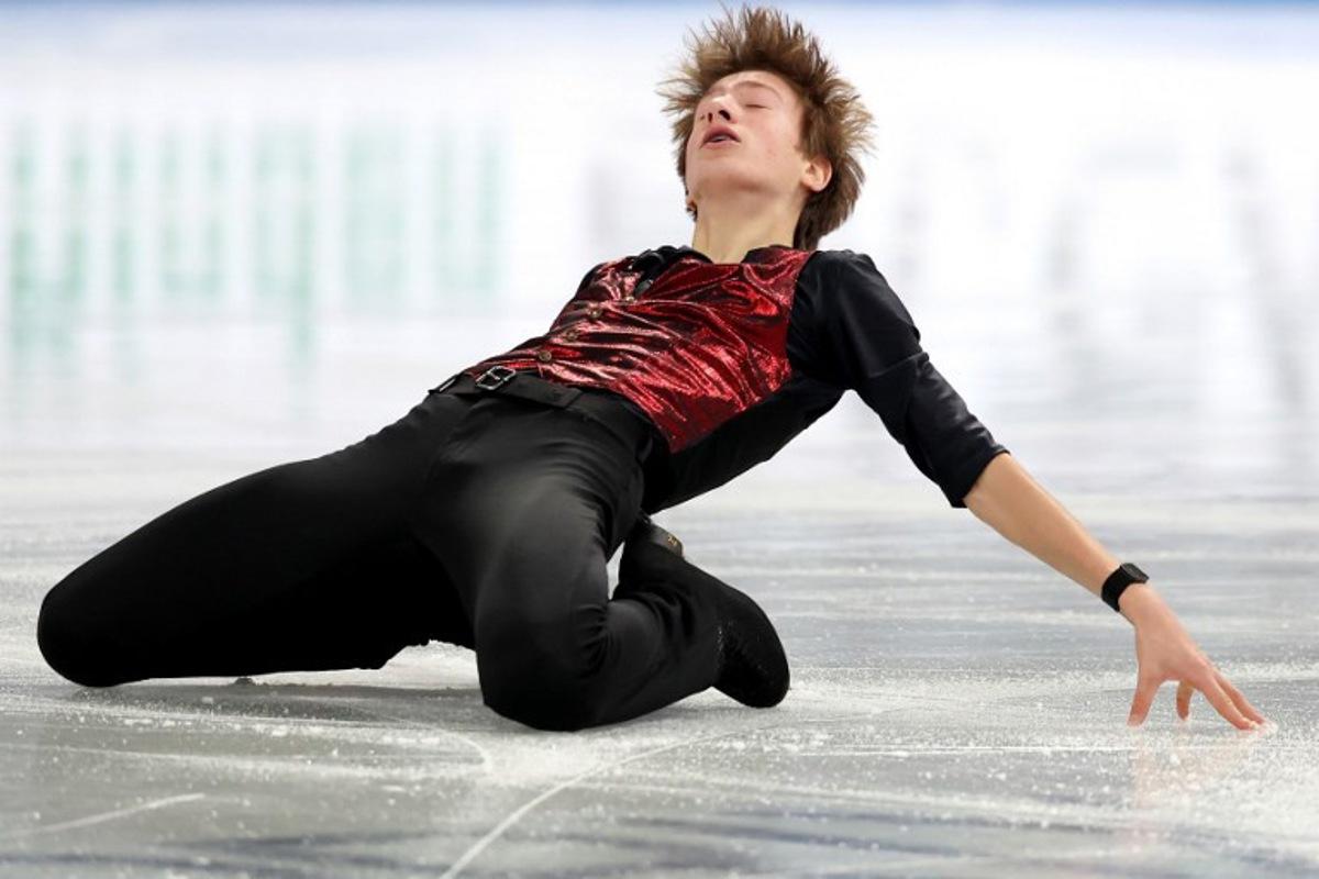 Belgium's Denis Krouglov competes in the Junior Men Short Program at the ISU Grand Prix of Figure Skating Final in Nagoya on December 4, 2025.  PAUL MILLER / AFP