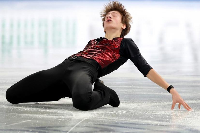 Belgium's Denis Krouglov competes in the Junior Men Short Program at the ISU Grand Prix of Figure Skating Final in Nagoya on December 4, 2025.  PAUL MILLER / AFP