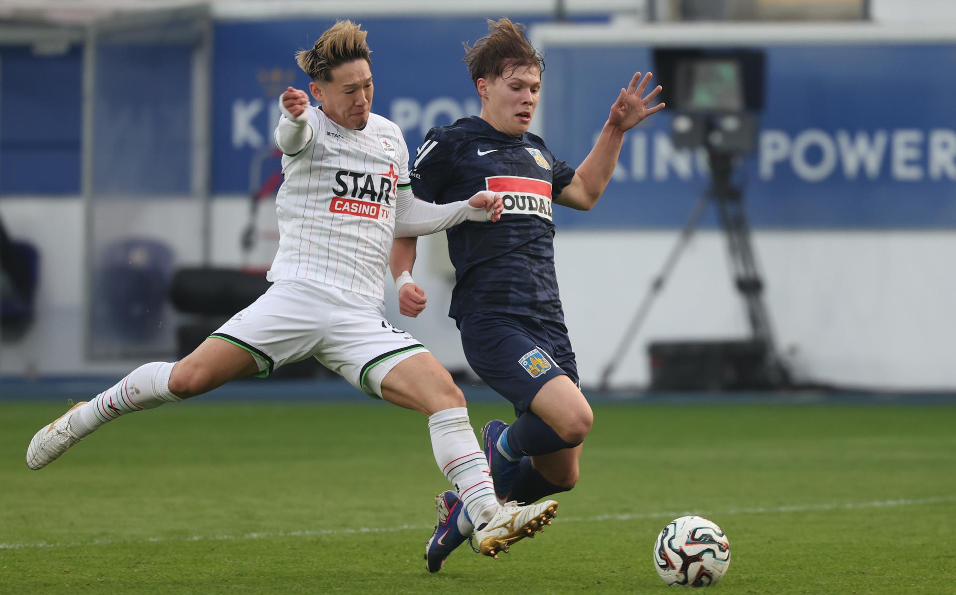 OHL's Takahiro Akimoto and Westerlo's Afonso Patrao fight for the ball during a soccer match between Oud-Heverlee Leuven and KVC Westerlo, Saturday 07 March 2026 in Leuven, on day 28 of the 2025-2026 'Jupiler Pro League' first division of the Belgian championship. BELGA PHOTO VIRGINIE LEFOUR