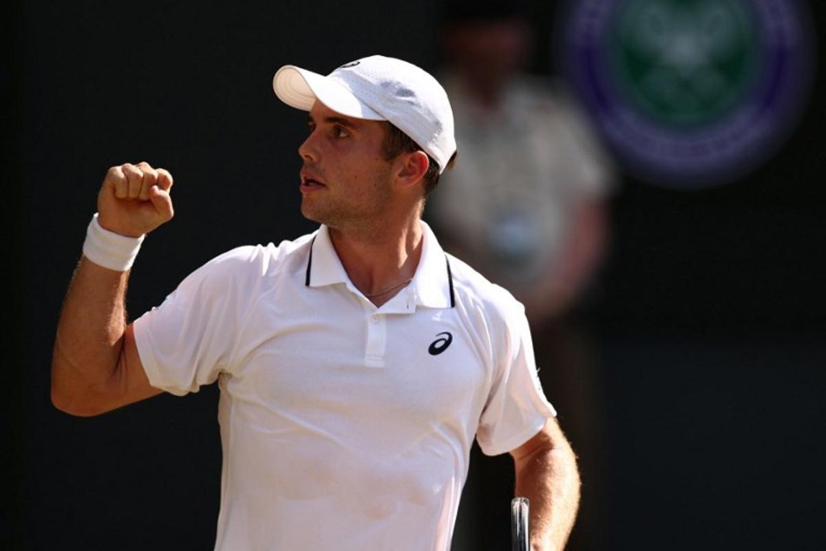 Britain's Arthur Fery celebrates winning the second set against Italy's Flavio Cobolli during their men's singles quarter-final tennis match on the tenth day of the 2026 Wimbledon Championships at The All England Lawn Tennis and Croquet Club in Wimbledon, southwest London, on July 8, 2026.  Henry Nicholls / AFP