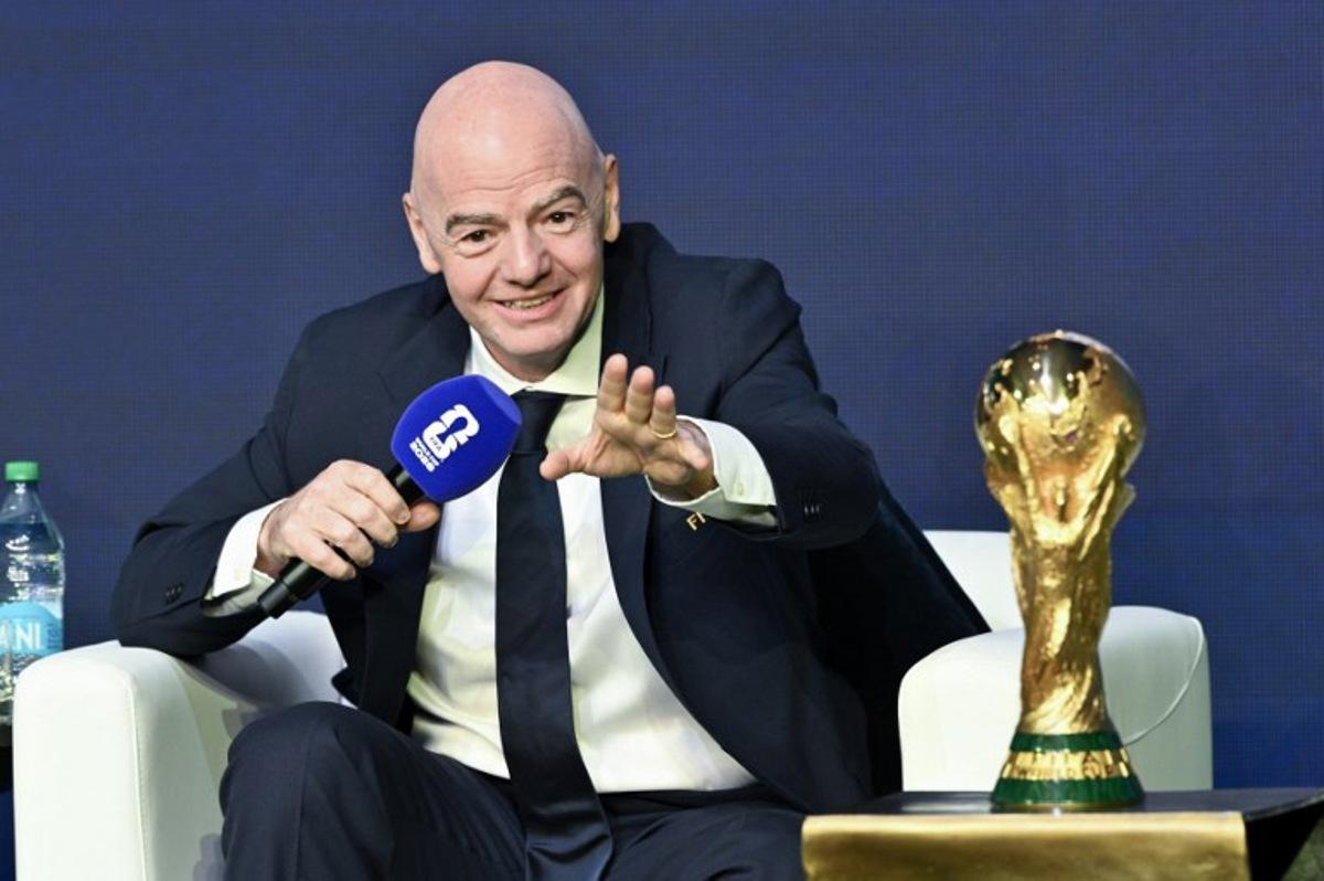 FIFA President Gianni Infantino speaks during the FIFA World Cup 2026 official match schedule announcement in Washington, DC, on December 6, 2025.  Roberto SCHMIDT / AFP