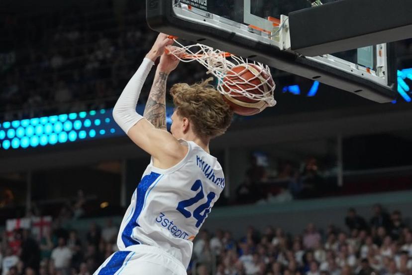 Finland's forward #24 Miikka Muurinen scores during the FIBA EuroBasket 2025 quarter-final basketball match between Finland and Georgia in Riga, Latvia, on September 10, 2025.  Gints Ivuskans / AFP