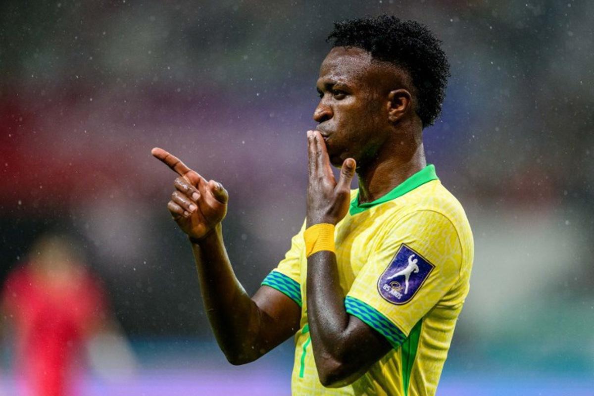 Brazil's Vinícius Jr. celebrates scoring a goal during a friendly football match between South Korea and Brazil at Seoul World Cup Stadium in Seoul on October 10, 2025.  ANTHONY WALLACE / AFP