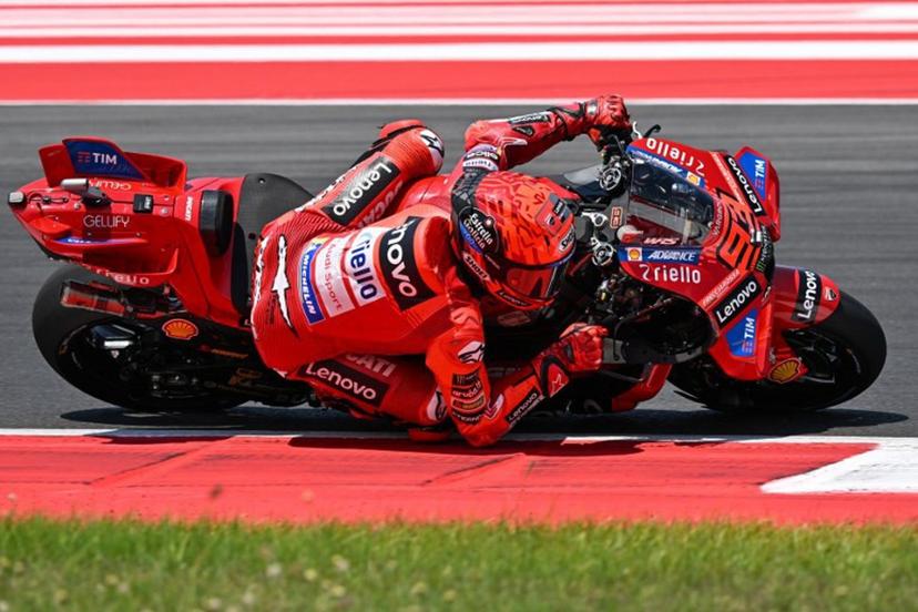 Ducati Lenovo Team's Spanish MotoGP rider Marc Marquez rides during the warm-up ahead of the MotoGP Indonesian Grand Prix at the Mandalika International Circuit in Mandalika, West Nusa Tenggara on October 5, 2025.  SONNY TUMBELAKA / AFP