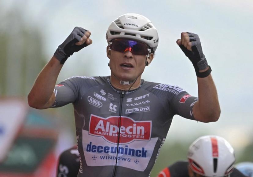Stage winner team Alpecin's Belgian rider Jasper Philipsen celebrates crossing first the finish line of the 19th stage of the Vuelta a Espana, a 159 km race between Rueda and Guijuelo, on September 12, 2025.    Miguel RIOPA / AFP