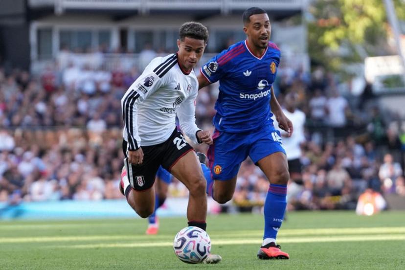 Fulham's English midfielder #24 Josh King (L) vies with Manchester United's Belgian midfielder #18 Youri Tielemans (R) during the English Premier League football match between Fulham and Manchester United at Craven Cottage in London on September 20, 2026.  CARLOS JASSO / AFP