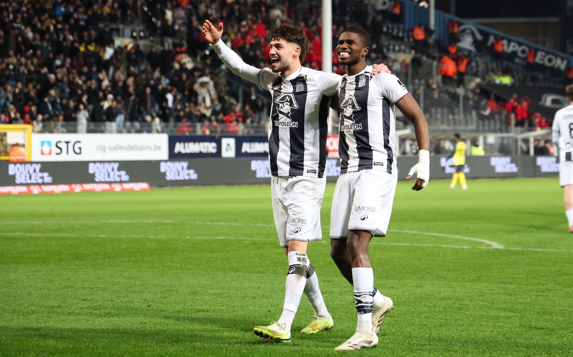Charleroi's Antoine Colassin and Charleroi's Check Keita celebrate during a soccer match between Sporting Charleroi and Royale Union Saint-Gilloise, Sunday 14 December 2025 in Charleroi, on day 18 of the 2025-2026 'Jupiler Pro League' first division of the Belgian championship. BELGA PHOTO VIRGINIE LEFOUR