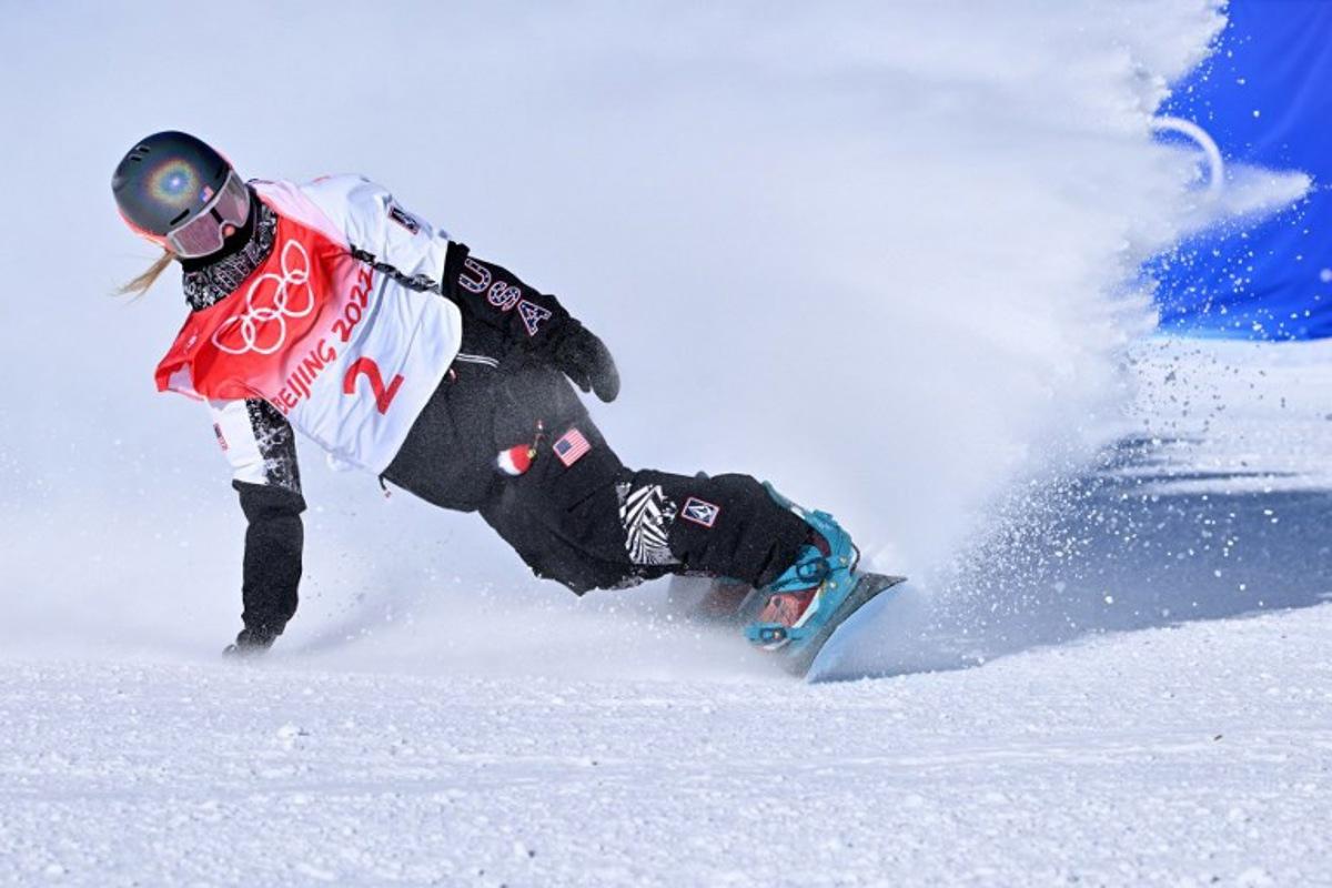 USA's Jamie Anderson competes in the snowboard women's slopestyle final run during the Beijing 2022 Winter Olympic Games at the Genting Snow Park H & S Stadium in Zhangjiakou on February 6, 2022.  Ben STANSALL / AFP