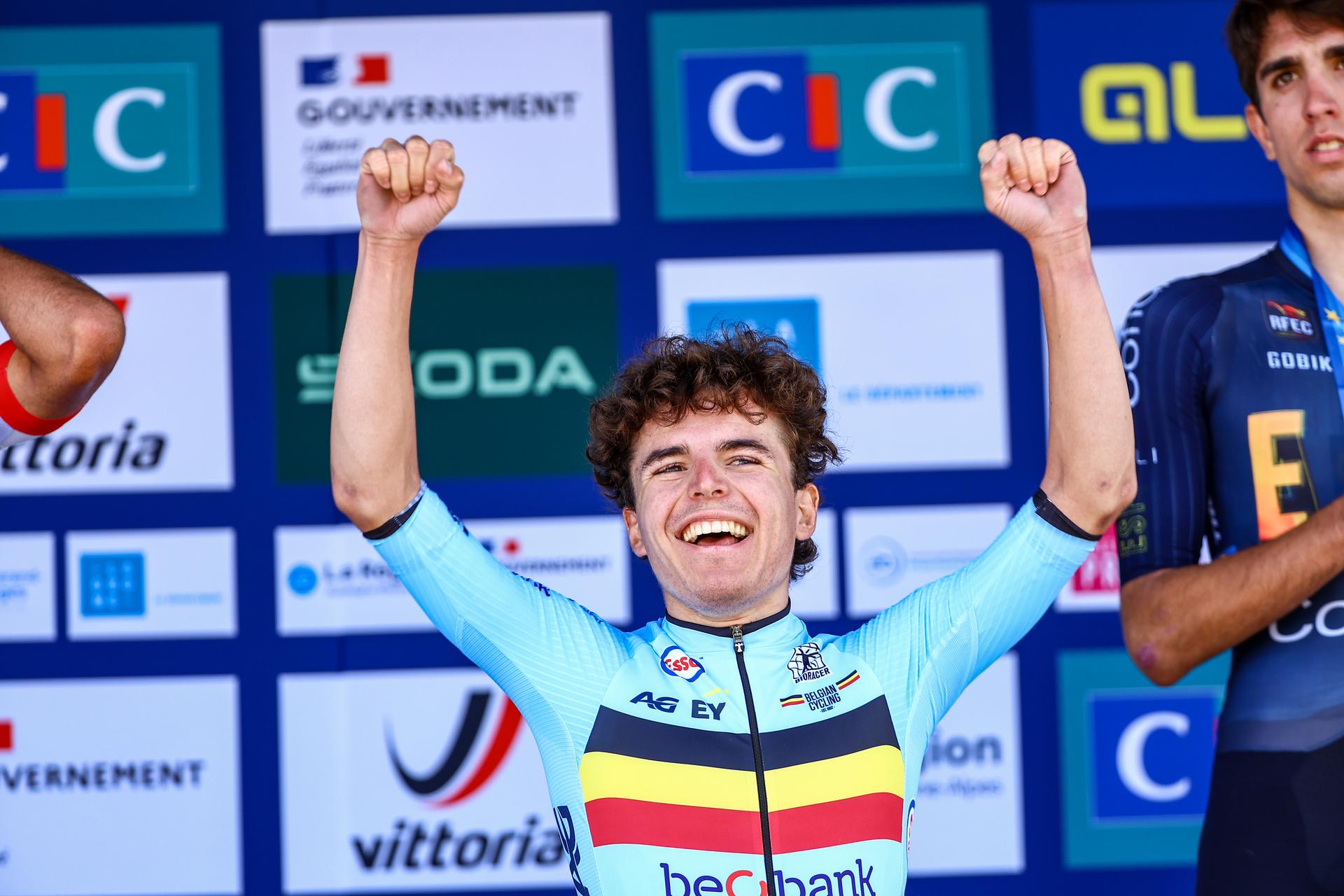 Belgian Jarno Widar celebrates on the podium after winning the 121,1 km Men U23 Road Race at the UEC road European cycling championships, in France on Saturday 04 October 2025. The European cycling championships in Drome-Ardeche takes place from 1 to 5 October. BELGA PHOTO DAVID PINTENS