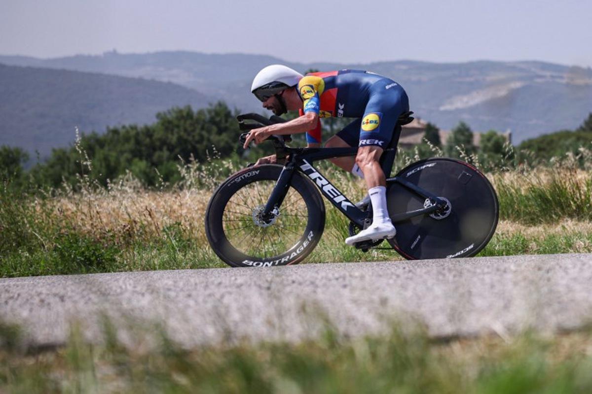 Lidl-Trek's French rider Julien Bernard cycles during the 4th stage of the 77th edition of the Criterium du Dauphine cycling race, a 17,4 km individual time trial between Charmes-sur-Rhône and Saint-Péray, on June 11, 2025.  Anne-Christine POUJOULAT / AFP