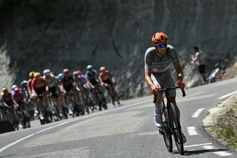 Netcompany INEOS team's French rider Kevin Vauquelin attempts a breakaway ahead of the pack of riders (peloton) during the 17th stage of the 113th edition of the Tour de France cycling race, 174,7 km between Chambéry and Voiron in the French Alps, on July 22, 2026.  Jeff PACHOUD / AFP