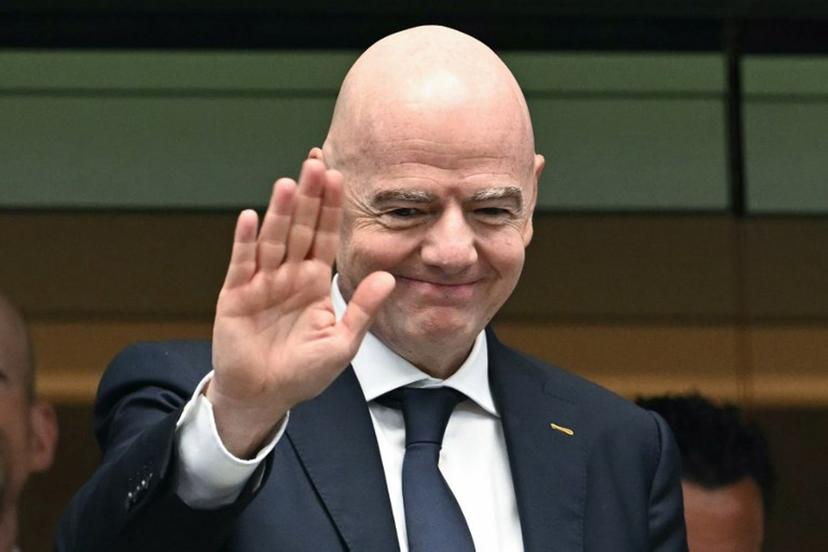 FIFA President Gianni Infantino gestures from the stands ahead of the 2026 World Cup football tournament semi-final match between France and Spain at the Dallas Stadium in Arlington on July 14, 2026.   RONALDO SCHEMIDT / AFP