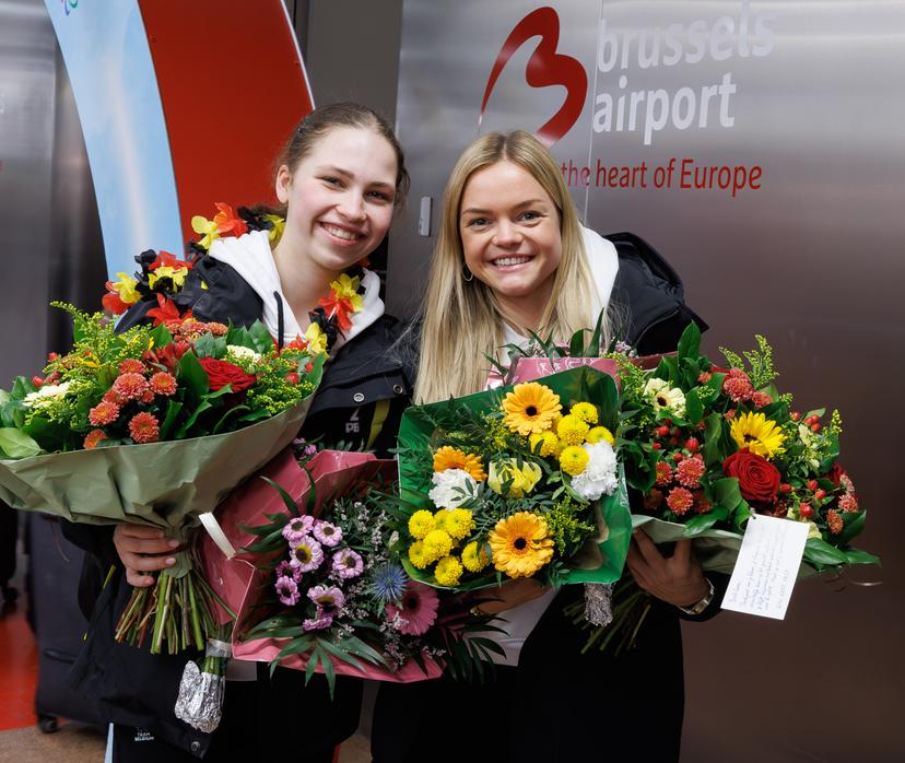 Belgian figure skater Nina Pinzarrone and Belgian figure skater Loena Hendrickx pictured during the arrival of Team Belgium from the Milano Cortina 2026 Olympic Winter Games, on Monday 23 February 2026, at Brussels Airport, in Zaventem. Belgium won a bronze medal in the shorttrack mixed relay. BELGA PHOTO BENOIT DOPPAGNE