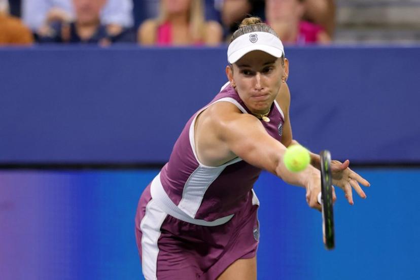 Belgium's Elise Mertens hits a return to Japan's Naomi Osaka in their women's singles third round tennis match on day seven of the US Open tennis tournament at the USTA Billie Jean King National Tennis Center in New York City on September 5, 2026.  KENA BETANCUR / AFP