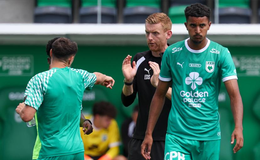 RAAL's Sami Lahssaini and RAAL's head coach Edward Still pictured during a friendly soccer game between RAAL La Louviere and Union Rochefortoise, on Saturday 04 July 2026 in La Louviere, in preparation of the upcoming 2026-2027 Belgian first division soccer season. BELGA PHOTO VIRGINIE LEFOUR