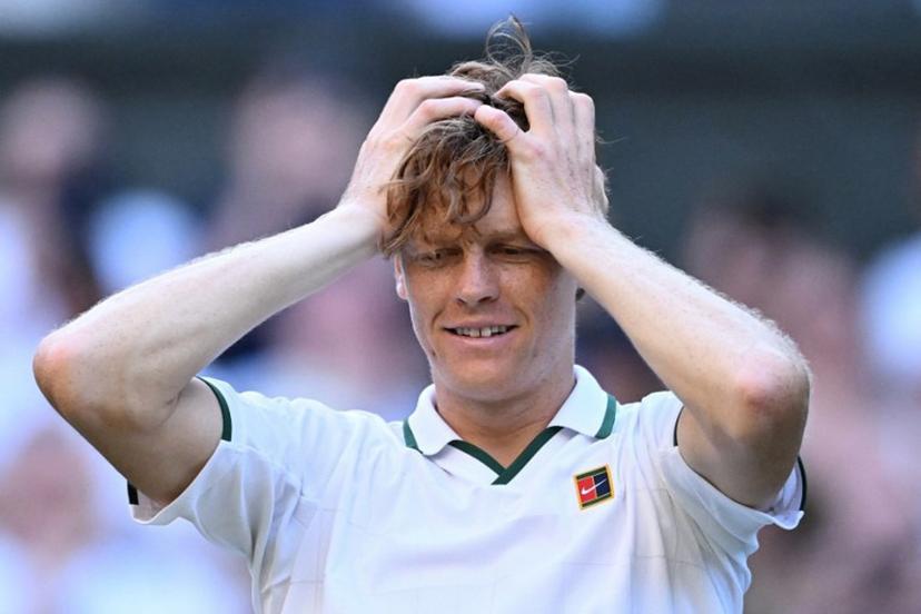 Italy's Jannik Sinner reacts to beating Germany's Alexander Zverev during their men's singles final tennis match on the fourteenth day of the 2026 Wimbledon Championships at The All England Lawn Tennis and Croquet Club in Wimbledon, southwest London, on July 12, 2026.  Kirill KUDRYAVTSEV / AFP