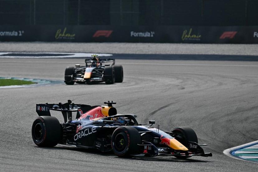 Red Bull Racing's Dutch driver Max Verstappen (front) and Red Bull Racing's French driver Isack Hadjar drive during the qualifying session of the Formula One Bahrain Grand Prix in Sepang on October 3, 2026.  Lillian SUWANRUMPHA / AFP