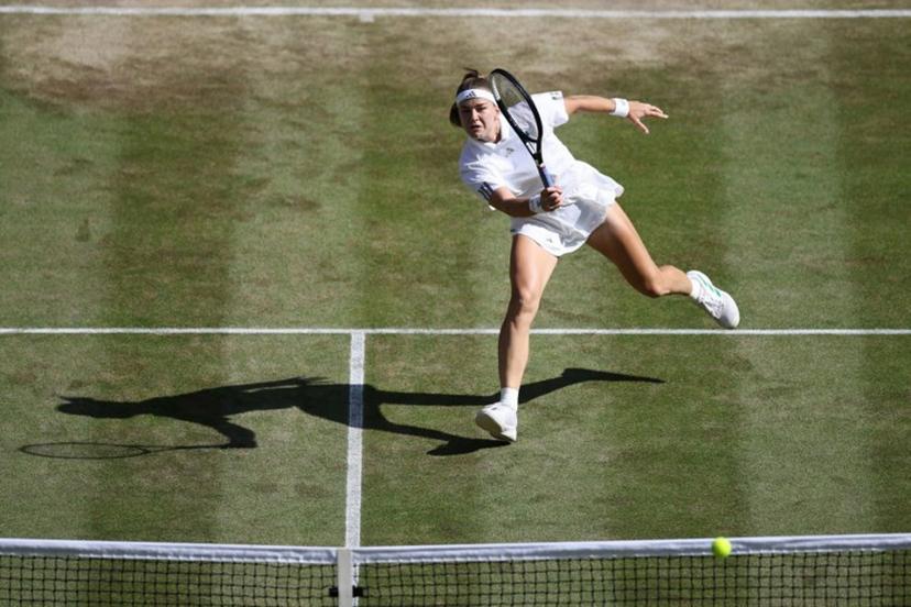 Czech Republic's Karolina Muchova returns against Japan's Naomi Osaka during their women's singles quarter-final tennis match on the ninth day of the 2026 Wimbledon Championships at The All England Lawn Tennis and Croquet Club in Wimbledon, southwest London, on July 7, 2026.  Henry NICHOLLS / AFP