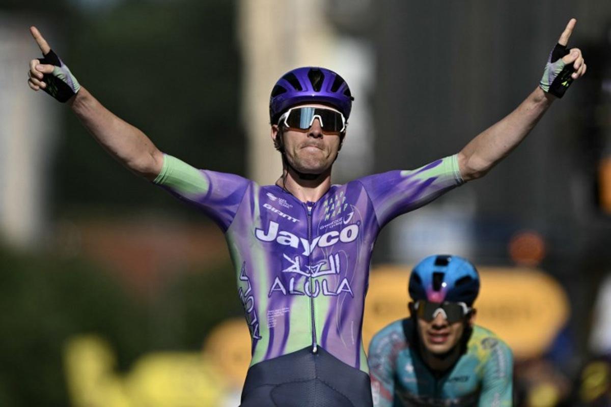 Team Jayco AlUla's Swiss rider Mauro Schmid cycles to the finish line ahead of XDS Astana Team's Colombian rider Harold Tejada (R) to win the 13th stage of the 113th edition of the Tour de France cycling race, 205,8 km between Dole and Belfort in eastern France, on July 17, 2026.  Jeff PACHOUD / AFP