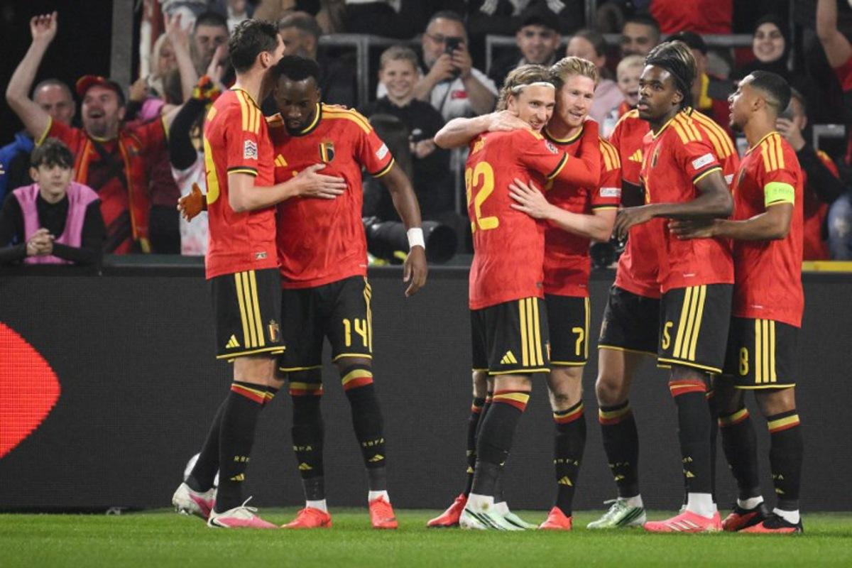 Belgium's midfielder #07 Kevin De Bruyne (C) celebrates with teammates after scoring his team first goal during the UEFA Nations League, League A - Group 1, football match between Belgium and Turkey at the Maurice Dufrasne stadium, in Liege, eastern Belgium on October 2, 2026.  JOHN THYS / AFP