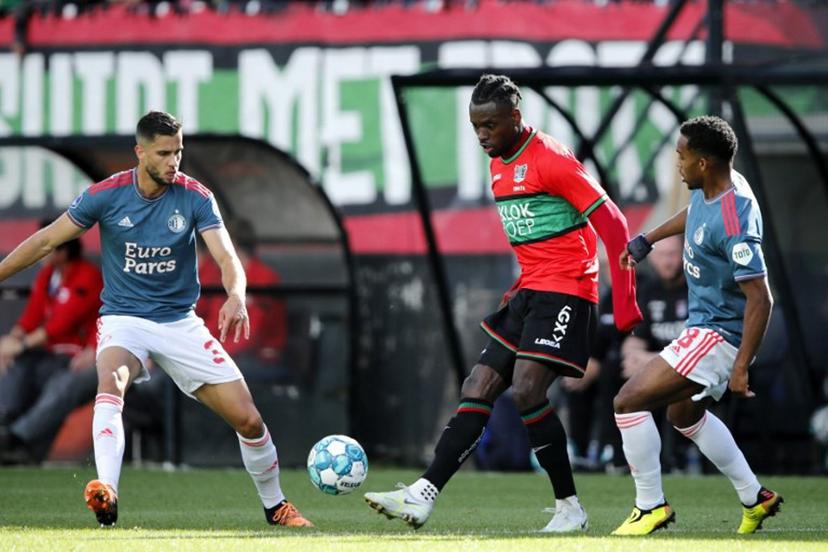 NEC Nijmegen's Belgian forward Landry Dimata (C) fights for the ball with Feyenoord's Slovakia's defender David Hancko (L) and Feyenoord's Netherlands' midfielder Quinten Timber during the Dutch Eredivisie football match between NEC and Feyenoord at De Goffert stadium, in Nijmegen, on October 2, 2022.  Bart Stoutjesdijk / ANP / AFP