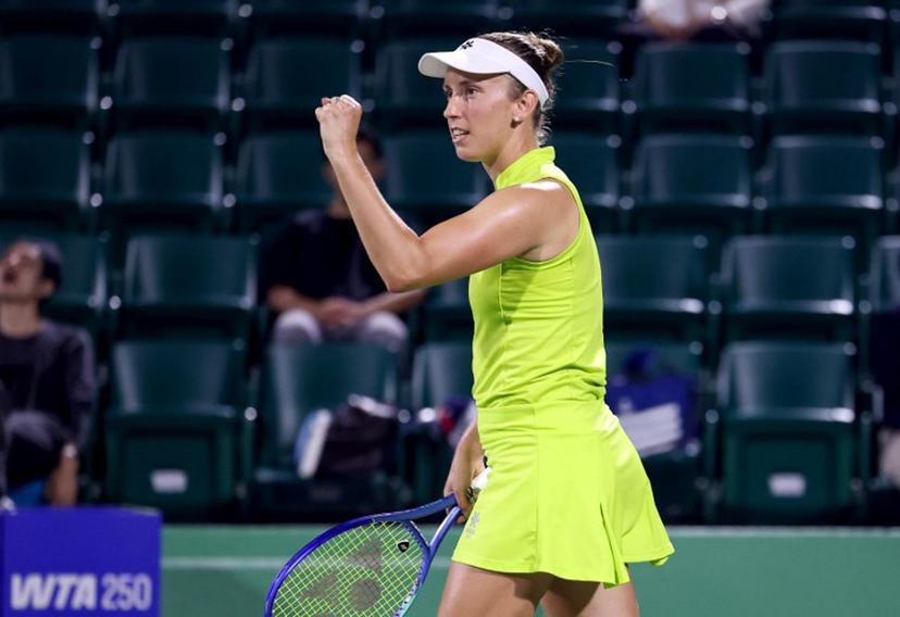 Belgium's Elise Mertens reacts to winning the first set against Spain's Cristina Busca during their women's singles match at the Japan Open tennis tournament in Osaka on October 14, 2025.  PAUL MILLER / AFP