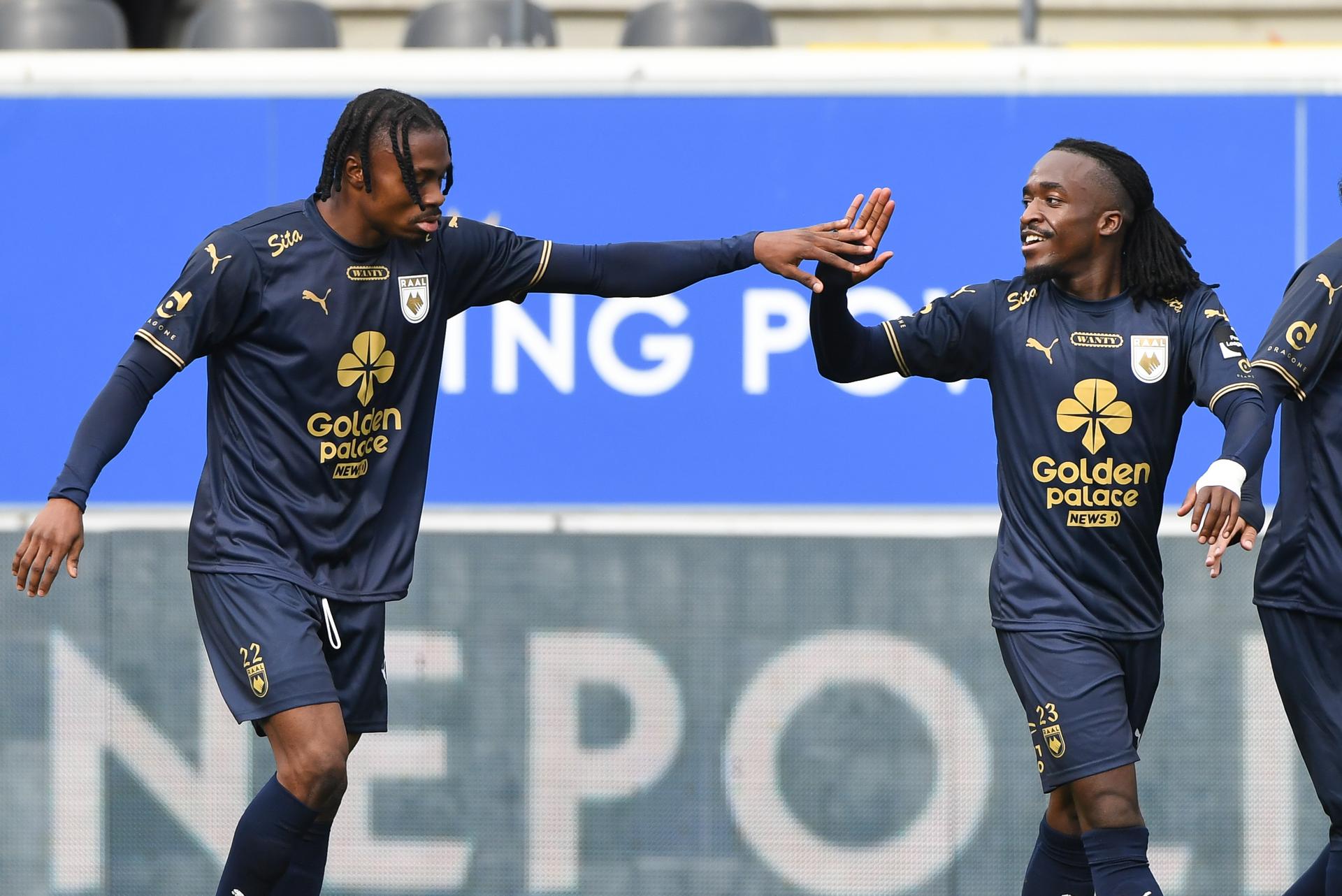 RAAL's Jerry Afriyie celebrates after scoring during a soccer match between Oud-Heverlee Leuven and RAAL La Louviere, Saturday 20 September 2025 in Heverlee, on day 8 of the 2025-2026 'Jupiler Pro League' first division of the Belgian championship. BELGA PHOTO JILL DELSAUX