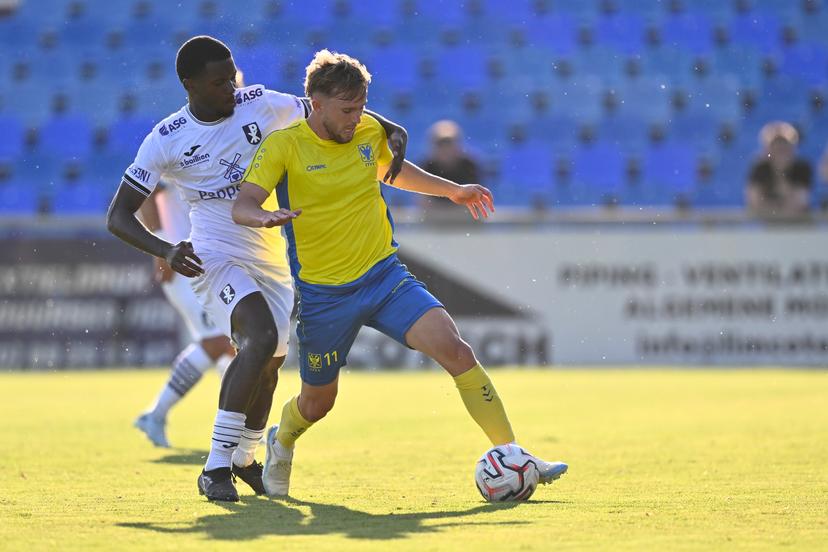 Patro Eisden's Keres Masangu and STVV's Isaias Delpupo fight for the ball during a friendly soccer game between second division soccer team Patro Eisden Maasmechelen and first division soccer team STVV, on Wednesday 15 July 2026 in Maasmechelen, in preparation of the upcoming 2026-2027 Belgian first division soccer season. BELGA PHOTO JOHAN EYCKENS