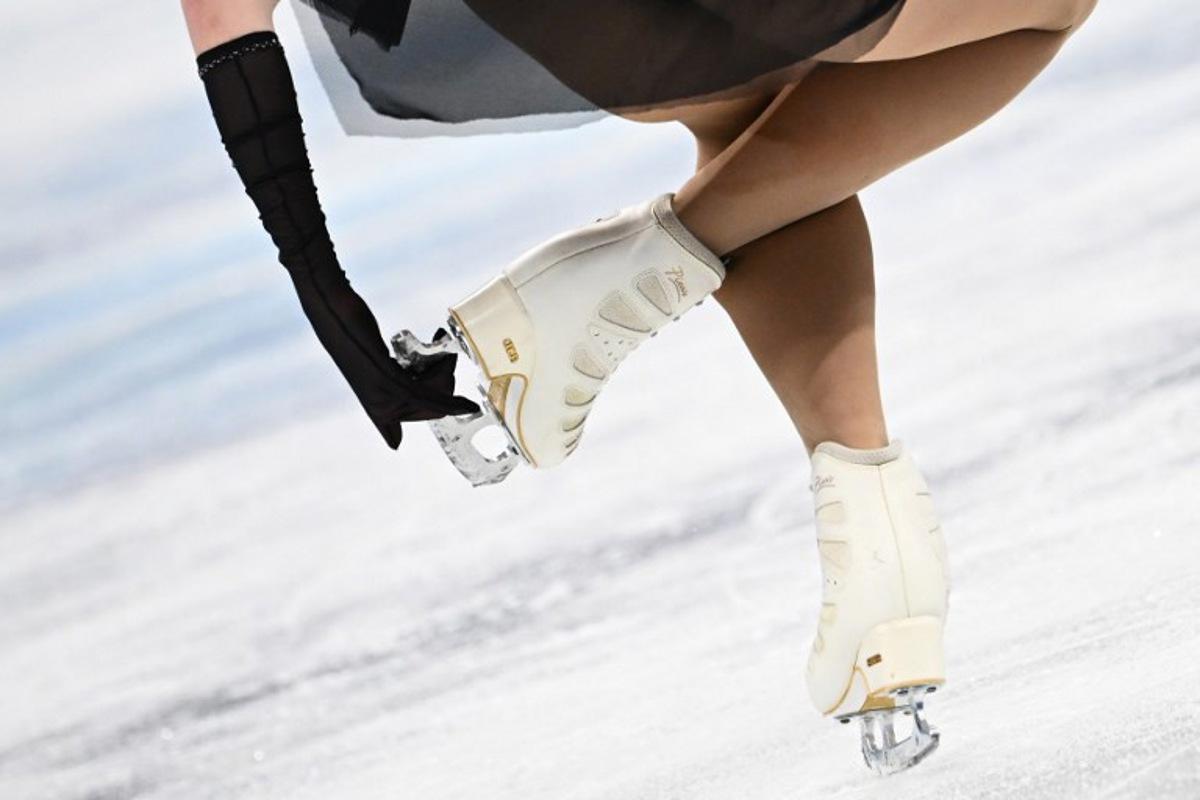 Belarus' Viktoriia Safonova competes in the women's single skating free skating of the figure skating event during the Beijing 2022 Winter Olympic Games at the Capital Indoor Stadium in Beijing on February 17, 2022.  Anne-Christine POUJOULAT / AFP
