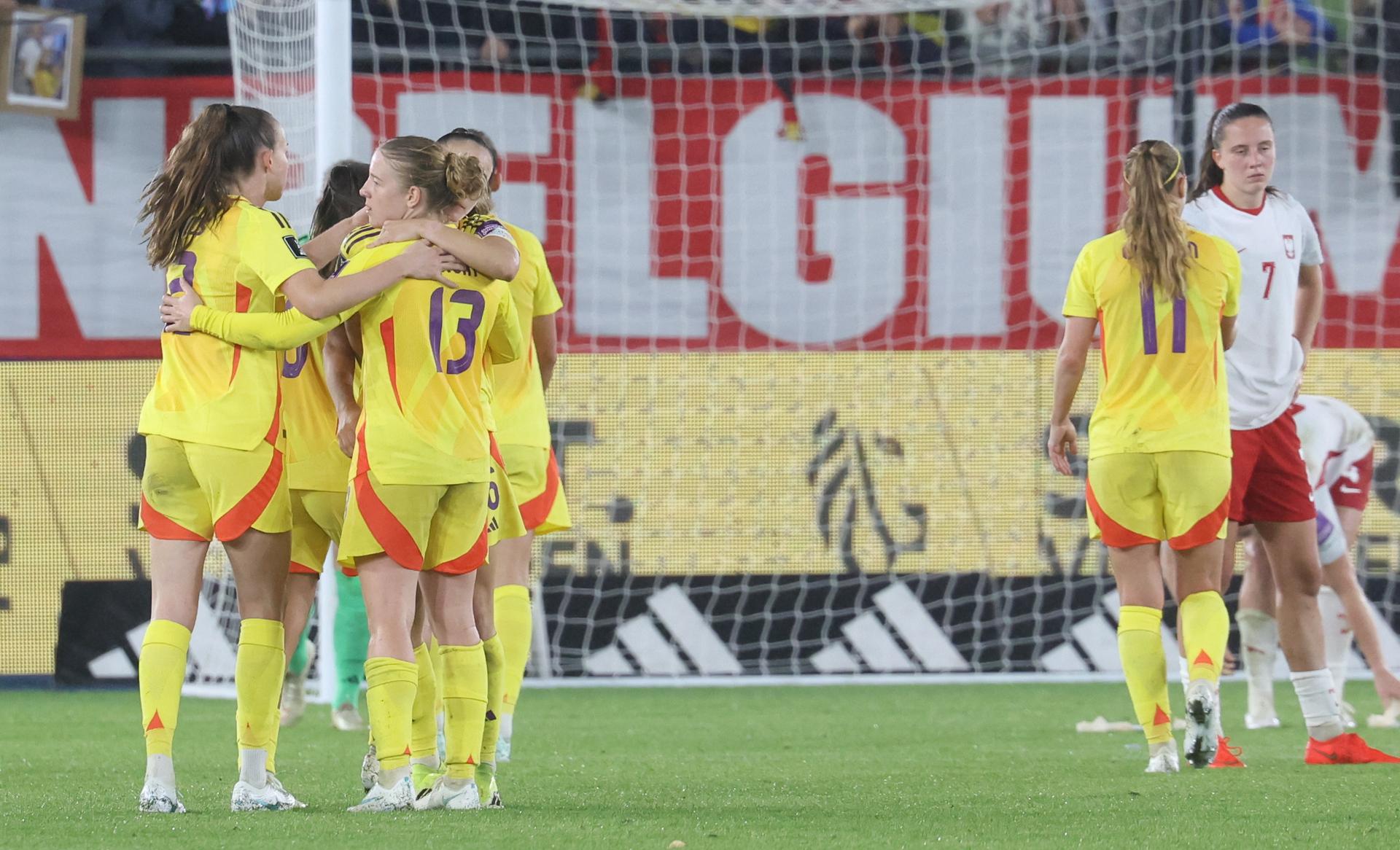 Belgium's players celebrate after winning a soccer game between Belgium's national women's team the Red Flames and Poland, on Friday 9 October 2026 in Leuven, the first leg of the play-off for the 2027 FIFA Women's World Cup. BELGA PHOTO VIRGINIE LEFOUR