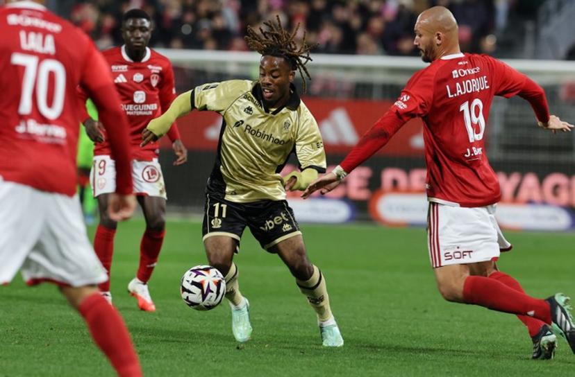 Nice's French-Ivorian forward #11 Elye Wahi controls the ball next to Brest's French forward #19 Ludovic Ajorque (R) during the French L1 football match between Stade Brestois 29 and OGC Nice at the Francis-Le Ble Stadium in Brest, western France on October 23, 2026.  Fred TANNEAU / AFP