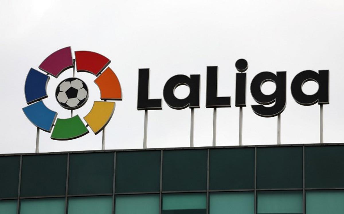 The logo of La Liga football association is seen ontop of its headquarters in Madrid on December 20, 2022. La Liga private sports association, composed of 42 clubs and SADs (public limited sports companies), is responsible for the organisation of the LaLiga Santander and LaLiga SmartBank national professional football competitions. Thomas COEX / AFP