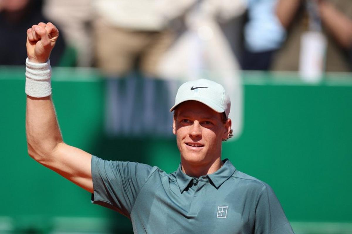 Italy's Jannik Sinner celebrates after winning over Czech Republic's Tomas Machac during their Monte Carlo ATP Masters Series Tournament round of 16 tennis match on Court Rainier III at the Monte-Carlo Country Club in Roquebrune-Cap-Martin, south-eastern France on April 9, 2026.  Valery HACHE / AFP