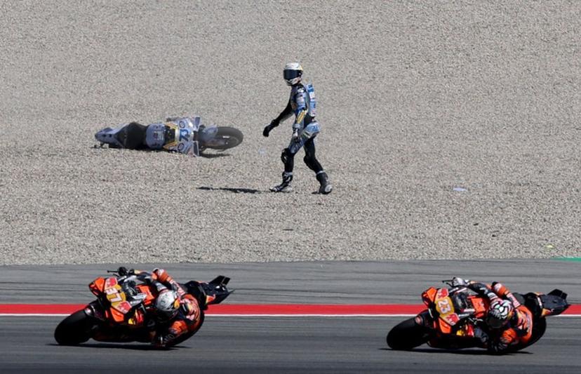 BK8 Gresini Racing MotoGP team's Spanish MotoGP rider Alex Marquez is pictured after falling during the MotoGP Sprint Race of the Moto Grand Prix of Catalonia at the Circuit de Catalunya on September 6, 2024 in Montmelo on the outskirts of Barcelona.   Lluis GENE / AFP