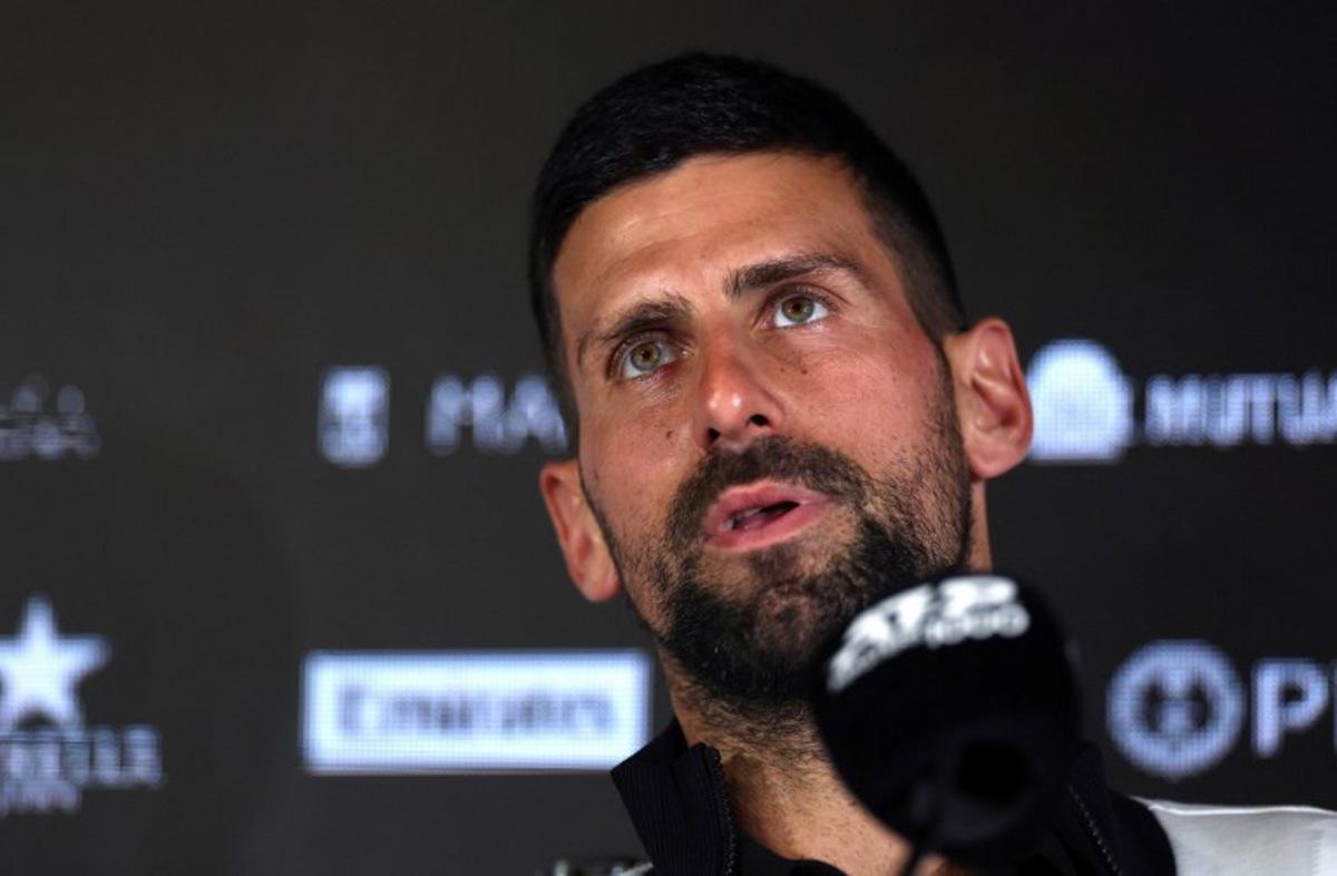 Serbia's Novak Djokovic answers to journalists during a press conference at the 2025 ATP Tour Madrid Open tennis tournament in Madrid, on April 24, 2025.   Thomas COEX / AFP