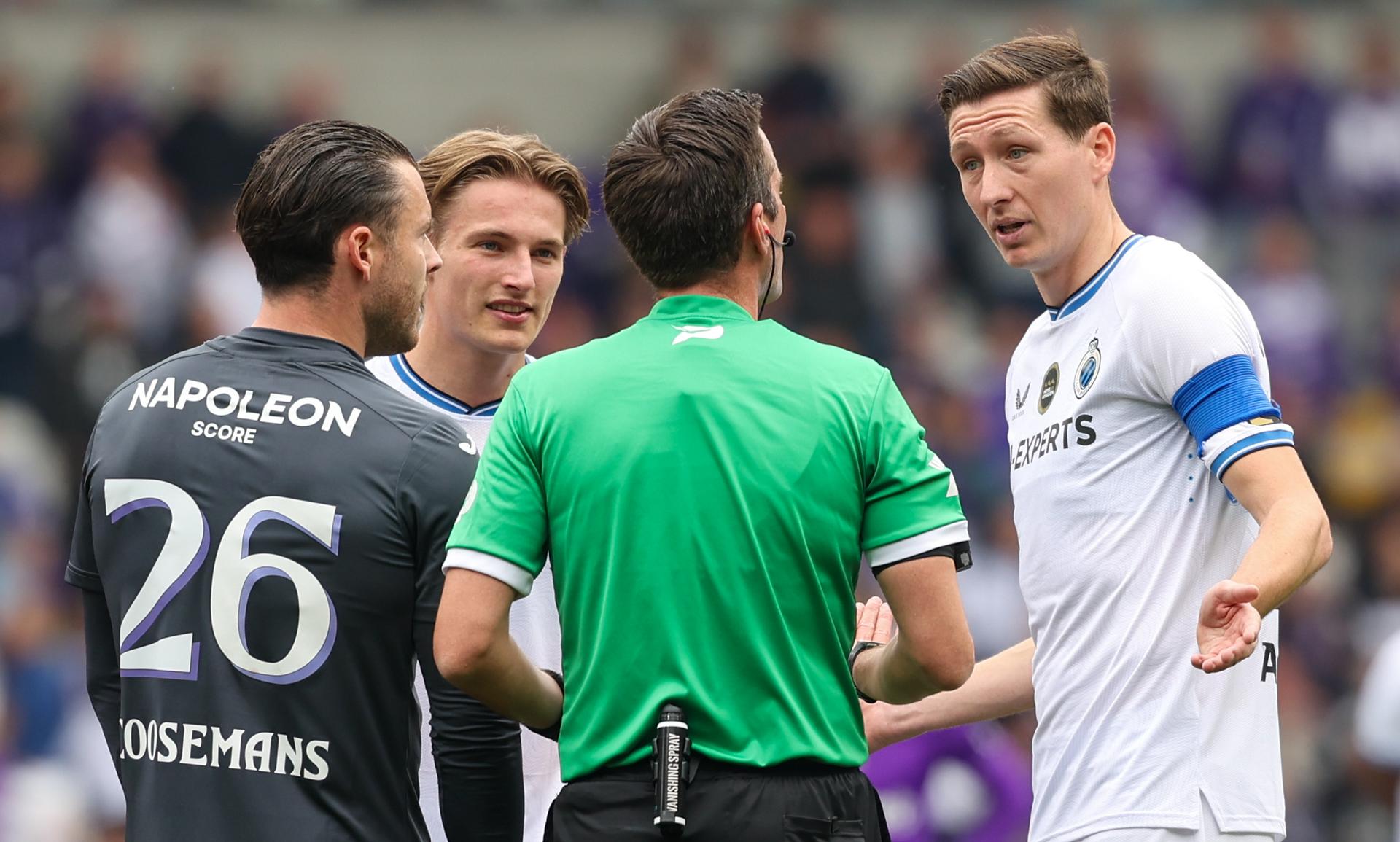 Anderlecht's goalkeeper Colin Coosemans, Club's Romeo Vermant referee Erik Lambrechts and Club's Hans Vanaken pictured during a soccer match between RSC Anderlecht and Club Brugge, Sunday 18 May 2025 in Brussels, on day 9 (out of 10) of the Champions' Play-offs of the 2024-2025 'Jupiler Pro League' first division of the Belgian championship. BELGA PHOTO VIRGINIE LEFOUR