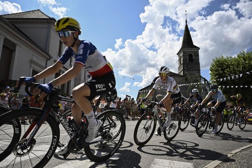 (FILES) FDJ-SUEZ team's French rider Marie Le Net (L) and Team SD Worx - Protime's Belgian rider Lotte Kopecky (C) ride in a breakaway during the 7th stage (out of 9) of the fourth edition of the Women's Tour de France - Tour de France Femmes cycling race, 159.7 km from Bourg-en-Bresse to Chambéry, in Chambéry, south-eastern France on August 1, 2025. The 5th edition of the Women's Tour de France will start in Lausanne on August 1, 2026. JULIEN DE ROSA / AFP