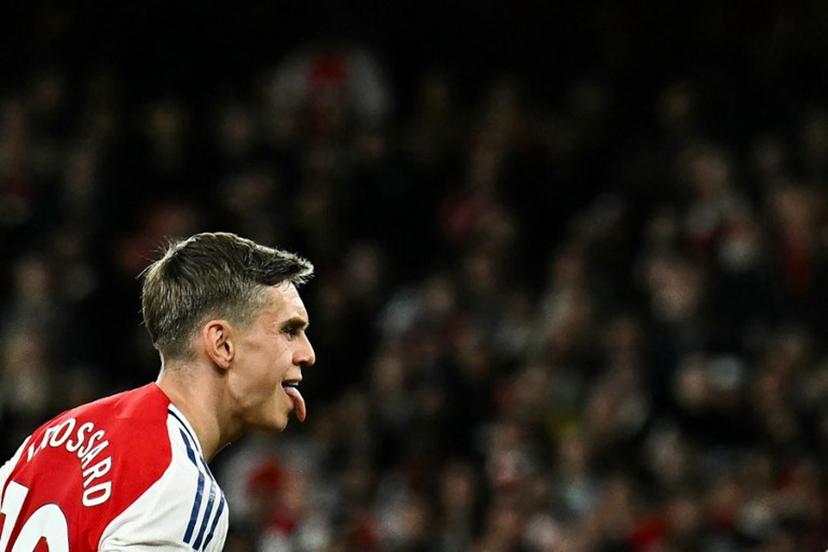 Arsenal's Belgian midfielder #19 Leandro Trossard celebrates after scoring his team second goal during the English Premier League football match between Arsenal and Crystal Palace at the Emirates Stadium in London on April 23, 2025.   Ben STANSALL / AFP