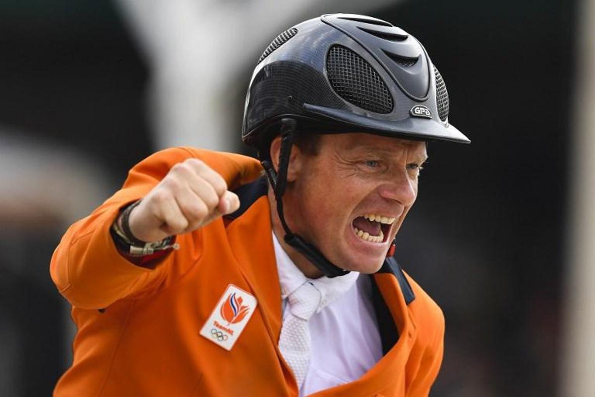 Netherlands's Willem Greve reacts as he rides his horse Carambole during the Longines FEI Jumping Nations Cup Final at the Olympic arena of the Real Club de Polo of Barcelona on October 3, 2021.  Pau BARRENA / AFP