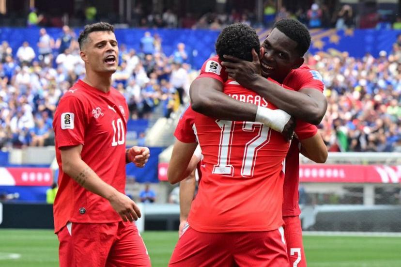 Switzerland's forward #17 Ruben Vargas celebrates scoring his team's second goal with teammates during the 2026 World Cup Group B football match between Switzerland and Bosnia and Herzegovina at Los Angeles Stadium in Inglewood on June 18, 2026.   Frederic J. Brown / AFP