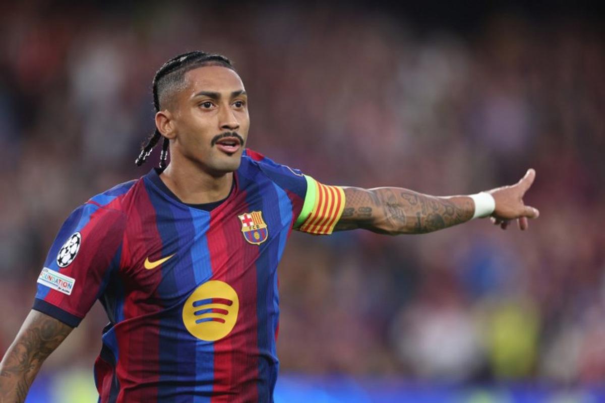 Barcelona's Brazilian forward #11 Raphinha celebrates scoring his team's third goal during the UEFA Champions League first round day 1 football match between FC Barcelona and Feyenoord at Camp Nou stadium in Barcelona on September 9, 2026.  Josep LAGO / AFP