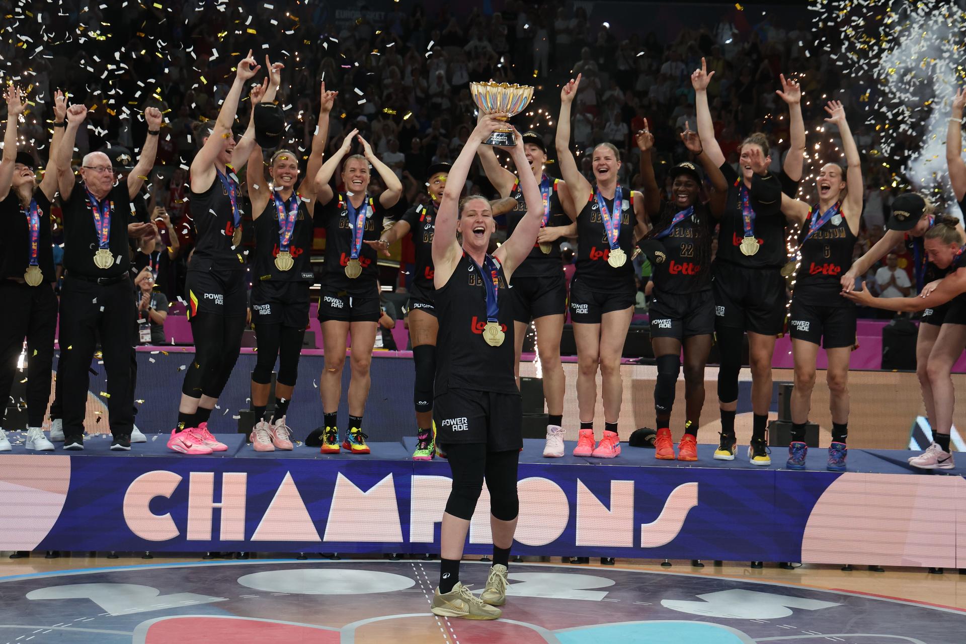 Belgium's captain Emma Meesseman celebrates with the cup on the podium after winning a basketball match between Spain and Belgian national team 'the Belgian Cats' on Sunday 29 June 2025 in Piraeus, Greece, the final of the FIBA Women's EuroBasket 2025.  BELGA PHOTO VIRGINIE LEFOUR