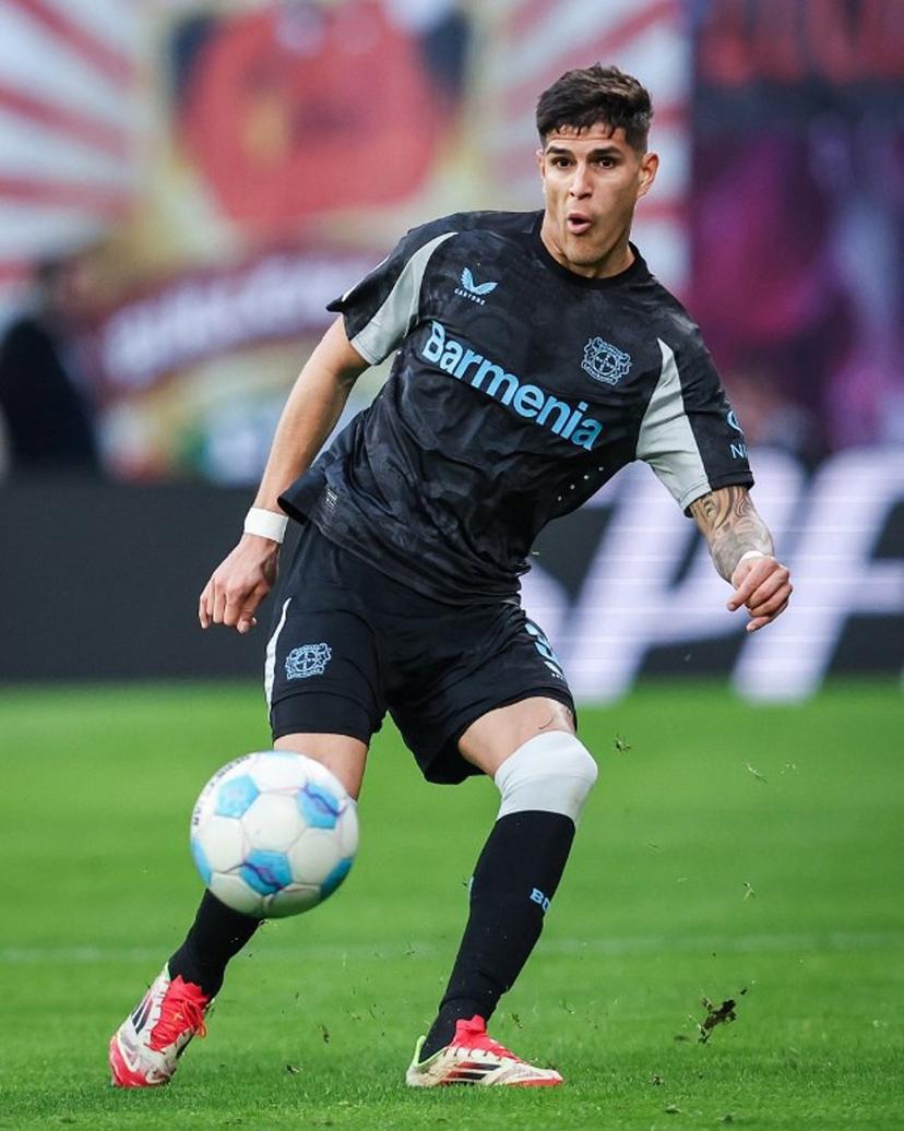 Bayer Leverkusen's Ecuadorian defender #03 Piero Hincapie plays the ball during the German first division Bundesliga football match RB Leipzig vs Bayer 04 Leverkusen in Leipzig, eastern Germany on January 25, 2025.   Ronny Hartmann / AFP