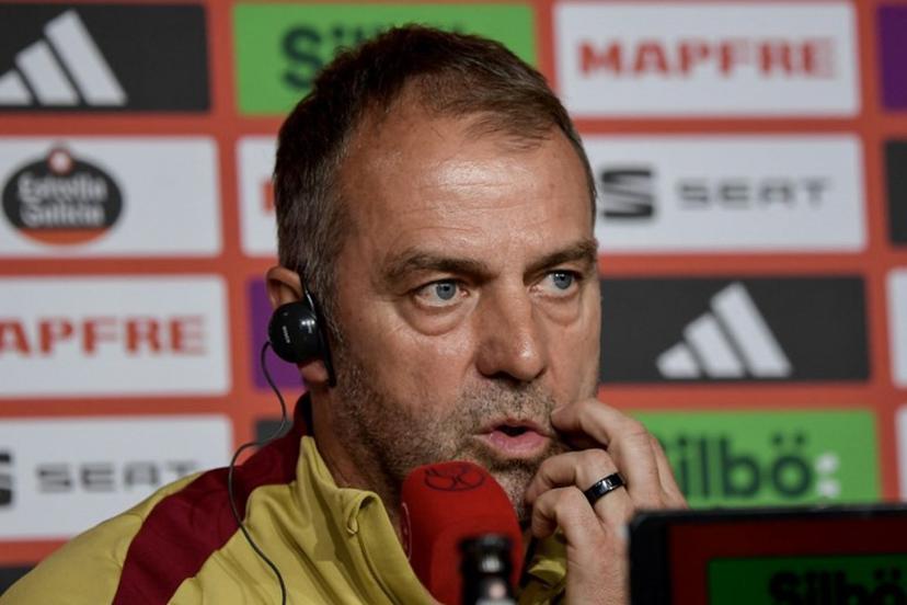 Barcelona's German coach Hans-Dieter Flick looks on during a press conference at La Cartuja stadium on the eve of their Spanish Cup (King's Cup) final between FC Barcelona and Real Madrid CF in Seville, on April 25, 2025.  CRISTINA QUICLER / AFP