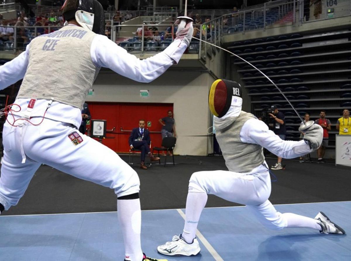 Belgium's Stef Van Campenhout (R) competes against Czech Republic's Alexander Choupenitch during the Fencing - Men's Foil Individual competition at the European Games 2023 in Krakow on June 26, 2023.   JANEK SKARZYNSKI / AFP