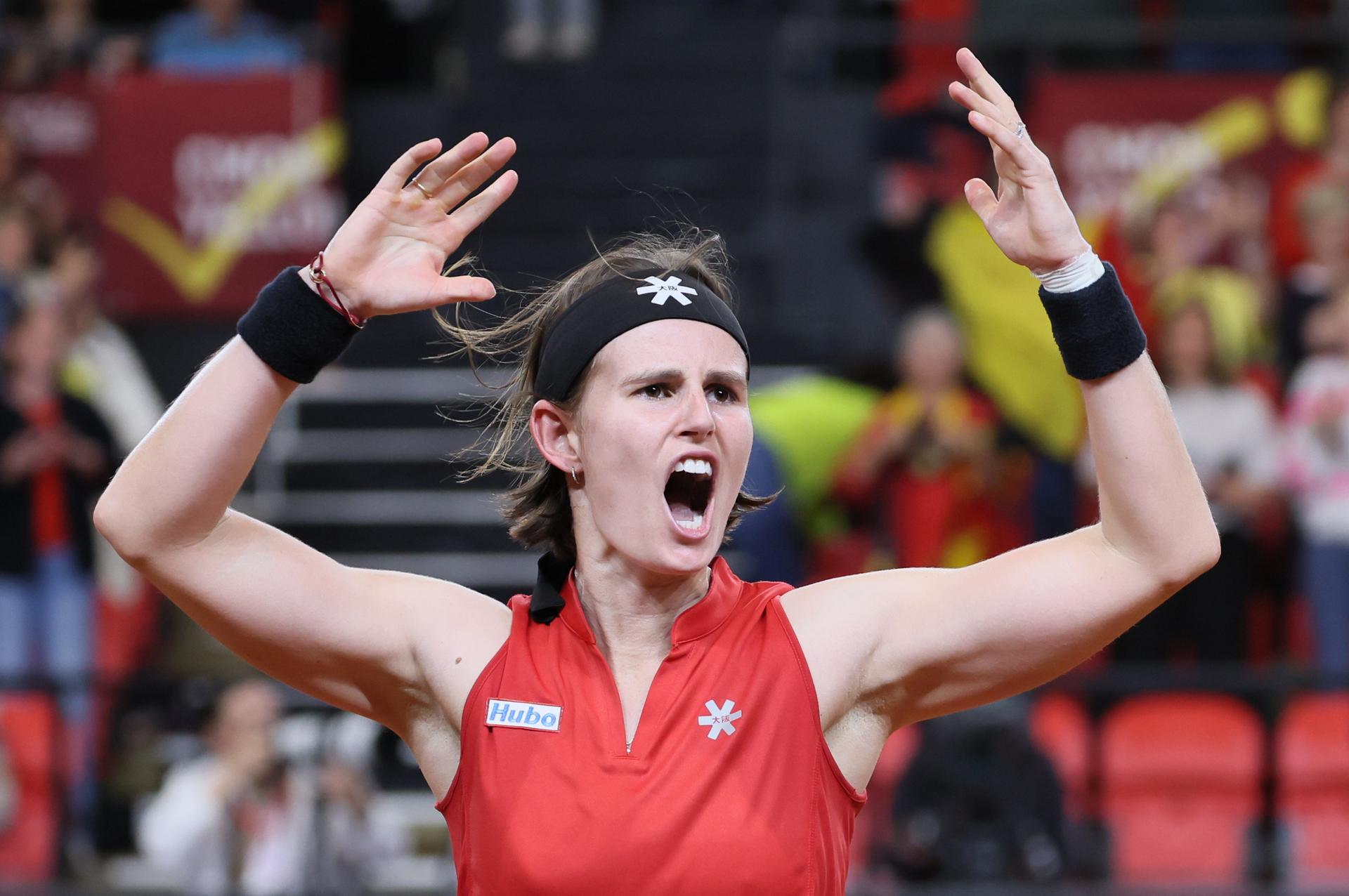 Belgian Greet Minnen and reacts after winning the fourth game between Belgian Minnen and US' Jovic on the second day of the qualifiers of the Billie Jean King Cup tennis between Belgium and the USA, in Oostende, Belgium, on . The meeting takes place on 10 and 11th April. PHOTO BENOIT DOPPAGNE