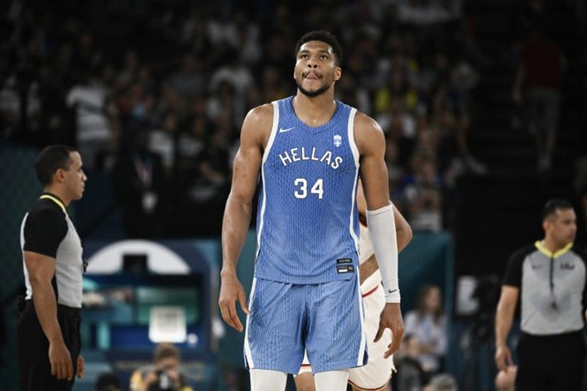Greece's #34 Giannis Antetokounmpo looks on during the men's quarterfinal basketball match between Germany and Greece during the Paris 2024 Olympic Games at the Bercy  Arena in Paris on August 6, 2024.  Aris MESSINIS / AFP