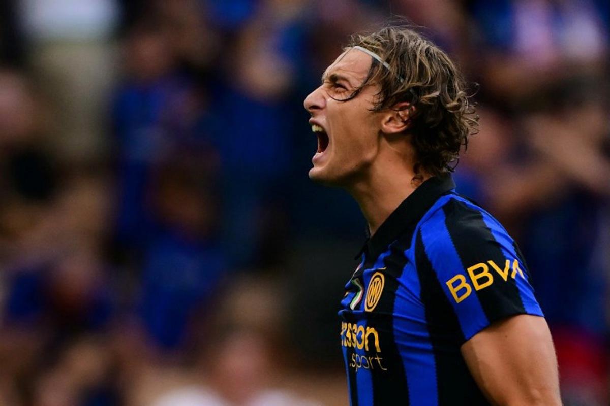 Inter Milan's Italian forward #94 Francesco Pio Esposito celebrates after scoring his team third goal during the Italian Serie A football match between Inter Milan and AC Monza at the San Siro stadium in Milan, northern Italy on August 22, 2026.  Marco Bertorello / AFP