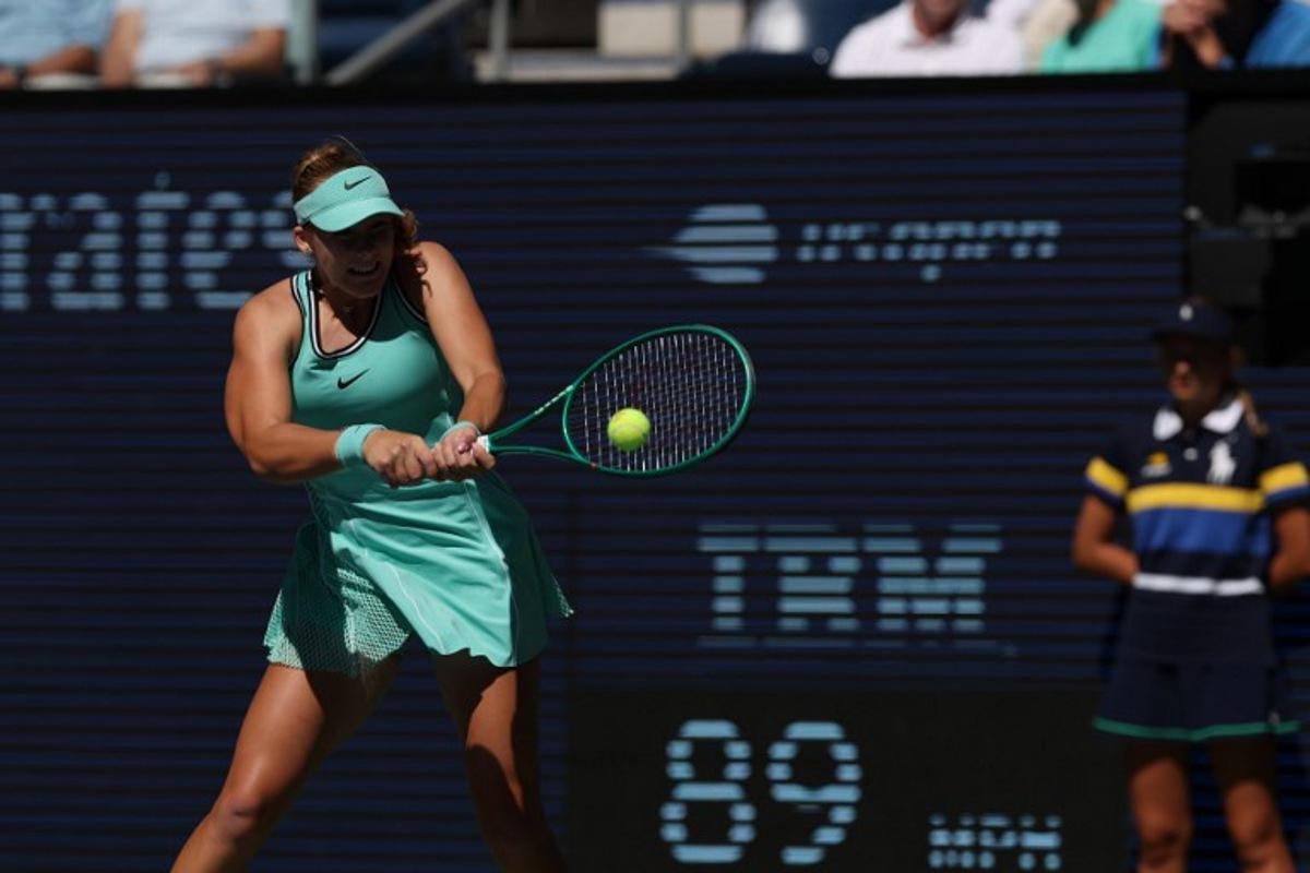 Russia's Mirra Andreeva hits a return against Austria's Anastasia Potapova during their women's singles round of 16 tennis match on day nine of the US Open tennis tournament at the USTA Billie Jean King National Tennis Center in New York City on September 7, 2026.  TIMOTHY A. CLARY / AFP