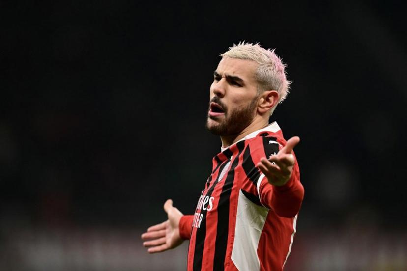 AC Milan's French defender #19 Theo Hernandez reacts during the UEFA Champions League knockout round play-off second leg football match between AC Milan and Feyenoord at San Siro stadium in Milan, on February 18, 2025.  Marco BERTORELLO / AFP